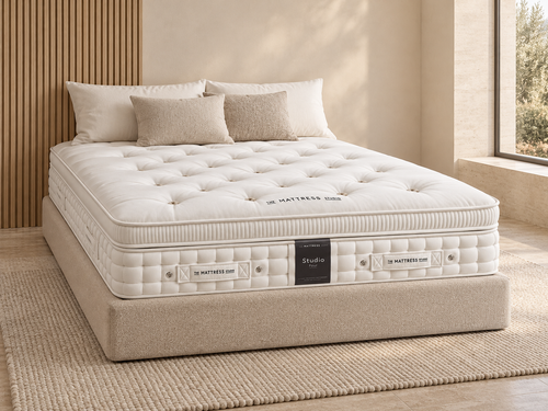 Studio Four mattress in a warm neutral bedroom