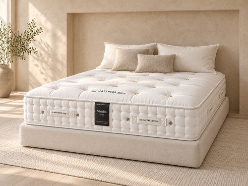 Studio Three mattress in a warm neutral bedroom